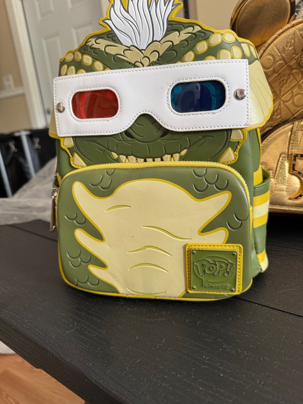 pop Olive Green and Cream Creature Mini Backpack with Red & Blue Lens Detail